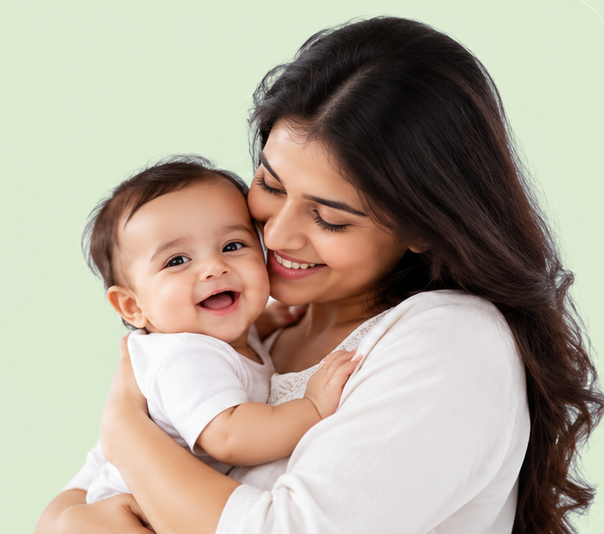 Smiling mother holding her baby